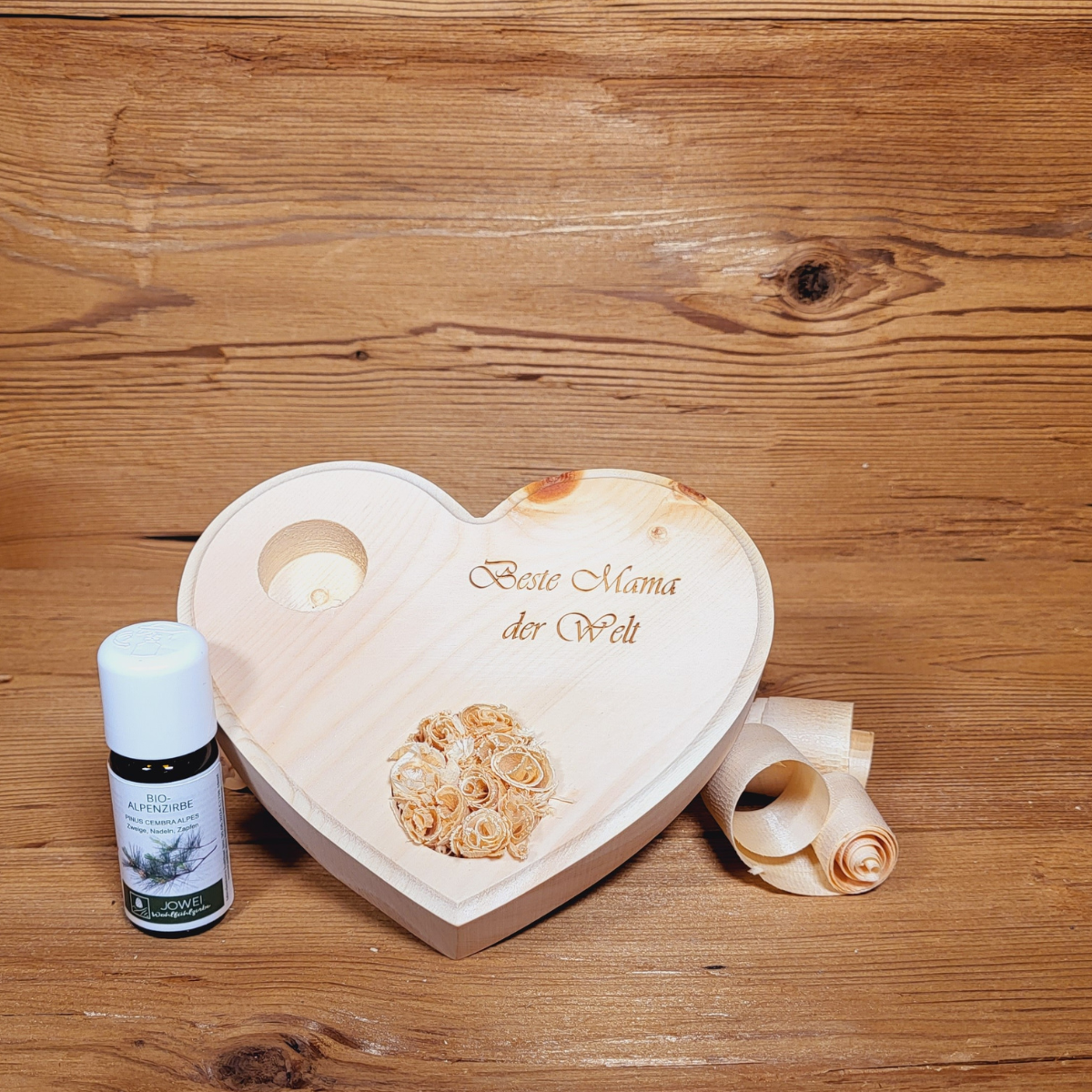 Zirbenherz graviert mit Zirbenrose inkl. 10 ml Bio Zirbenöl